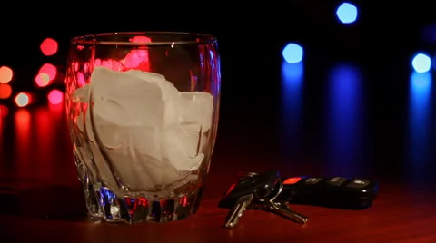 DUI Drunk Driving Glass and Keys Stock Footage