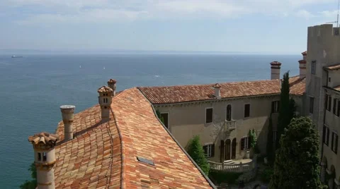 Duino castle over the rooftops looking into courtyard Stock Footage 68347067