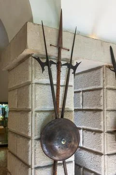 Duino, Italy August 24, 2008: ancient weapons (spears,shields) in the courtya Stock Photos