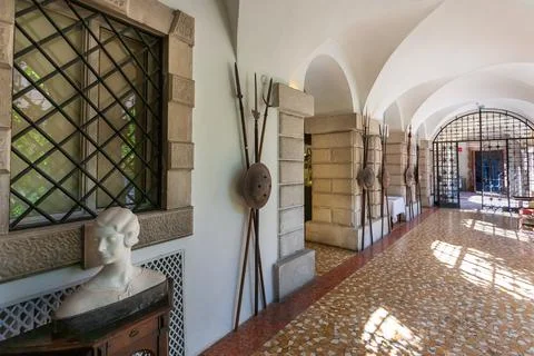 Duino, Italy August 24, 2008: ancient weapons (spears,shields) in the courtya Stock Photos