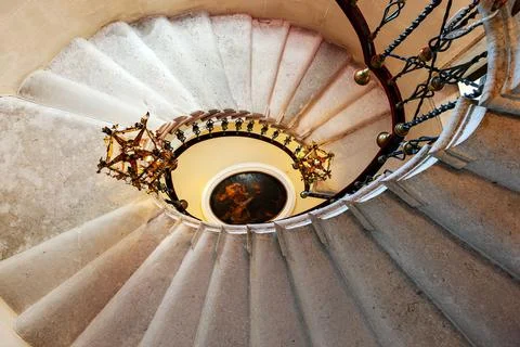 Duino, Italy - August 24, 2008: Spiral staircase in the Duino Castle, with .. Stock Photos