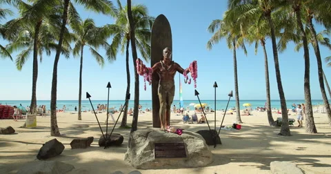 Duke Kahanamoku statue on Waikiki beach Stock Footage