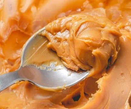 Dulce de leche ( Doce de leite ) in close-up. Stockfoto's