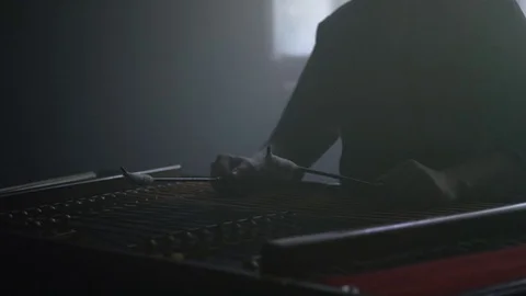 Dulcimer string instrument. Cembalo player playing music. Musician instrument Stock Footage 76177088