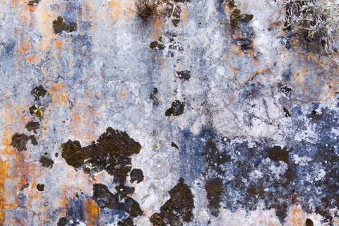 Dull stone mossy wall Stock Photos