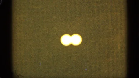 DULUTH MINNESOTA-1965: Time-Lapse of Glowing Orbs in Vintage 8mm Film Stock Footage 125501481