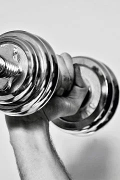 Dumbbell in action Stock Photos