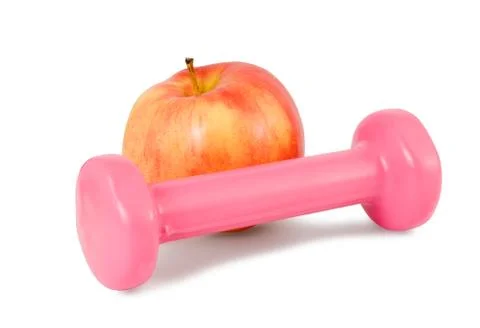 Dumbbell and apple Stock Photos