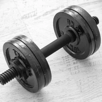 Dumbbell on desk Foto stock
