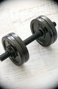 Dumbbell on desk Stock-Fotos