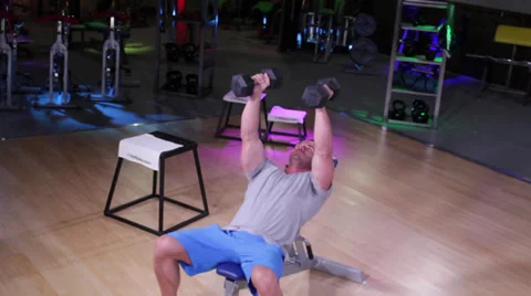 Dumbbell Fly Hold on Workout Bench Stock Footage 32422559