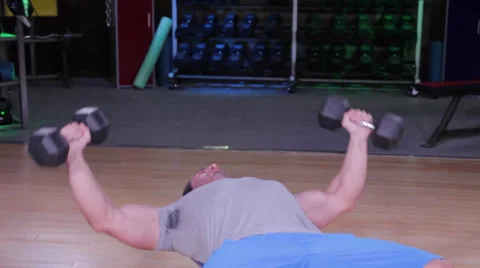 Dumbbell Fly on Weight Bench  Stock Footage 32422505