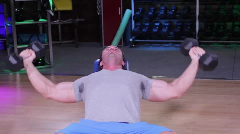 Dumbbell Fly on Weight Bench Stock Footage 32422507
