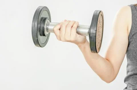 Dumbbell in hand Stock Photos