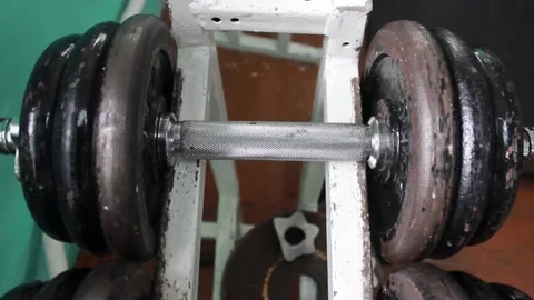 Dumbbells at the gym closeup Stock Footage 124700162