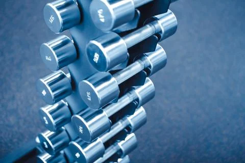 Dumbbells in the gym Stock Photos