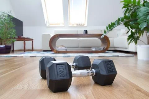 Dumbbells in interior Stock Photos