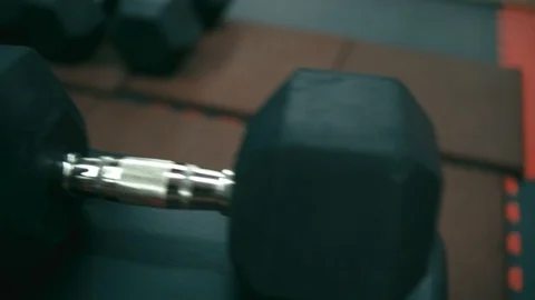 Dumbbels on gym bench Stock Footage 90308711