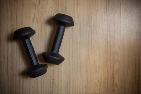 Dumbell on a floor Stock Photos