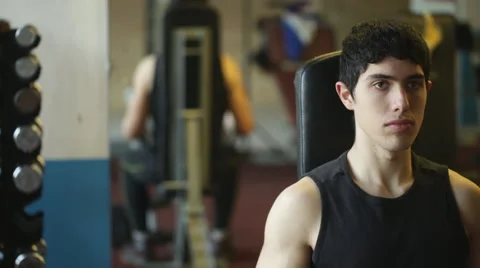 Dumbell workout in gym Stock Footage 64172297