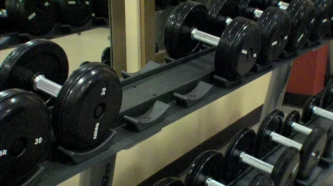 Dumbells being picked up off the rack - NTSC 스톡 동영상 641226