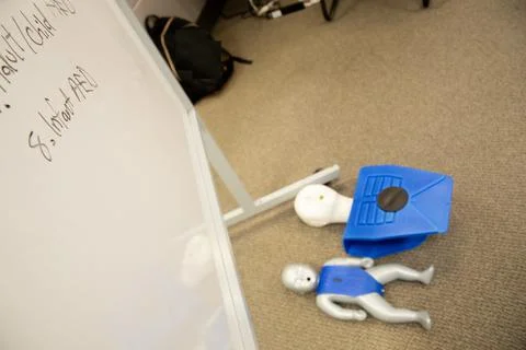 Dummies on the floor for CPR first aid training Stock Photos