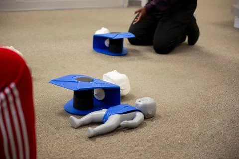 Dummies on the floor for CPR first aid training Stock Photos