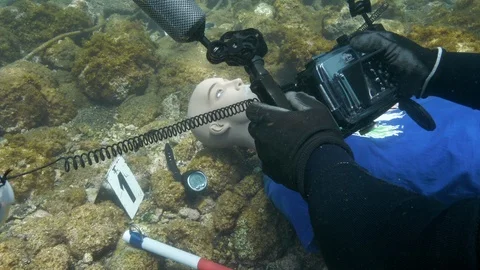 Dummy close up on the seabed with diver, Ustica, Sicily, Mediterranean sea Stock-Footage 124128356