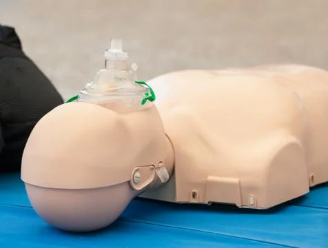 Dummy with mask used for CPR 스톡 사진