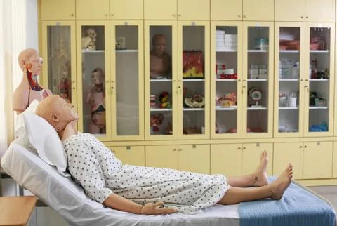 Dummy patient on the bed Stock Photos