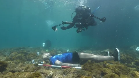 Dummy on the seabed with diver, Ustica, Sicily, Mediterranean sea Stock Footage 124145933