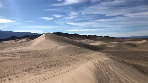 Dumont Dunes. Group of people drive on buggies at the dunes in California. Stock Footage 187759049