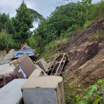 Dump of abandoned sofas and mattresses Stock-Fotos