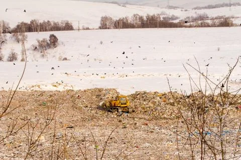 The dump and the bulldozer Stock Photos