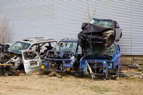 Dump of broken cars Photos