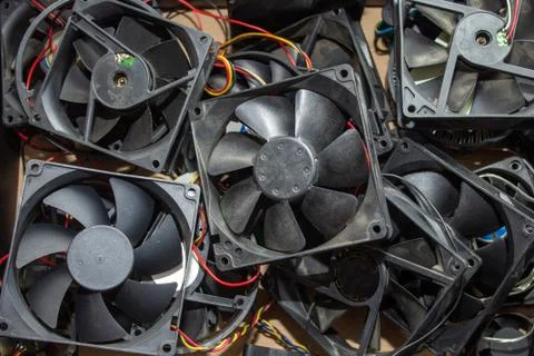 A dump of computer junk, a bunch of coolers from the computer, broken fans Foto stock