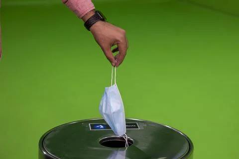 Dump face mask after use proper trash can 스톡 사진