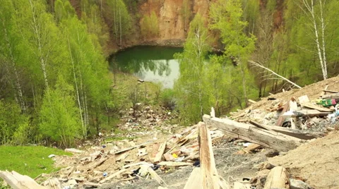 Dump lake. waste polluting the pond Stock Footage 63184288