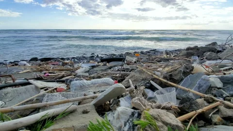 Dump of plastic garbage pollution on contaminated sea coast,environmental waste Stock Footage 152111240