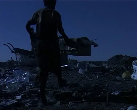 Dump site kid and small box Stock Footage 11498559