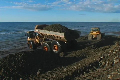 Dump truck on beach Stock Footage 491237