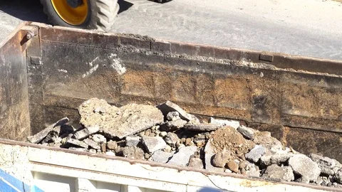 Dump truck being loaded with soil by shovel. Vidéo 81936895