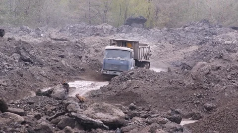 Dump truck on a dirty road Stock Footage 99178951