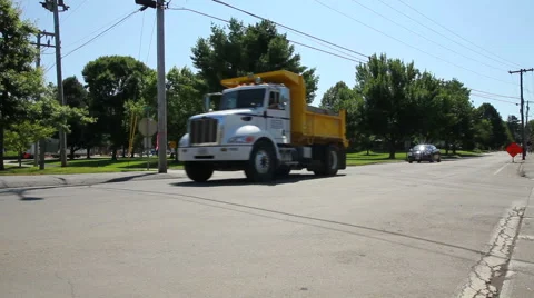 Dump truck driving down road, wide shot 스톡 동영상 40714875