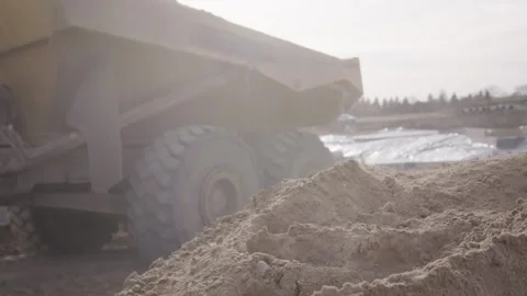 Dump Truck Driving Through Construction Site Slow Motion Stock Footage 144904906