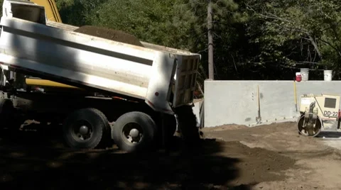 Dump truck dumping dirt Stock Footage 8684439