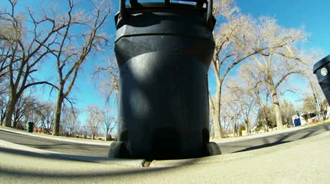 Dump Truck Gets two Garbage Cans Stock Footage 25237847