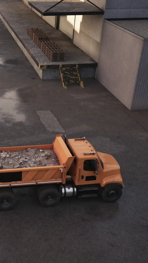 Dump truck moves material at construction site in industrial area Stock Footage 338353199