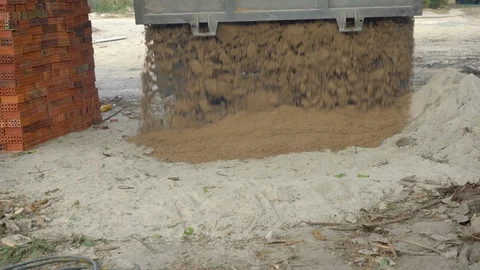 Dump truck is moving down sand in construction site. Stock Footage 122188076
