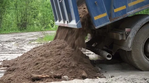 Dump truck throws out the ground Stock Footage 145426757